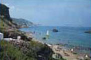 Sol i mar, amb precaució